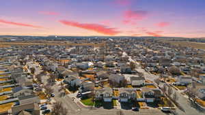 Aerial view at dusk of a residential view (Digitally enhanced photo)
