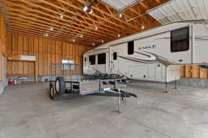 Garage featuring a garage door opener
