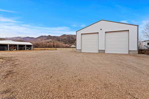 Detached garage with a mountain view