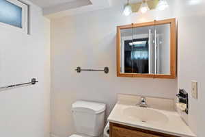 Bathroom with vanity and toilet