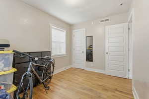 Office area featuring light wood finished floors and baseboards