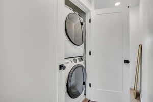 Laundry area featuring stacked washer / dryer