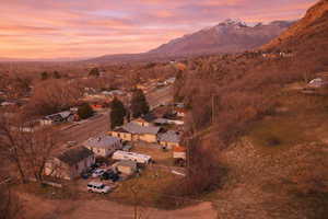 Aerial view at dusk of a mountain view and a residential view