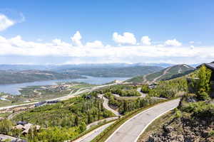 View of mountain backdrop with a large body of water
