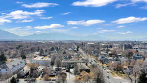 View of property location featuring a mountainous background and nearby suburban area