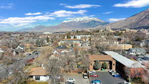Aerial view of property's location with a mountainous background