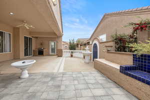 View of patio / terrace with a ceiling fan and area for grilling