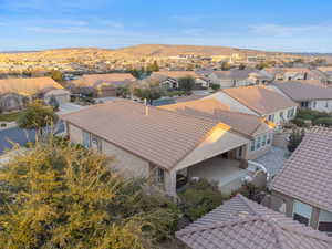 Aerial view of residential area featuring a mountain backdrop