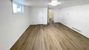 382 Family room with wood finished floors and baseboards