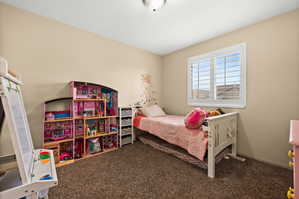 Bedroom with carpet
