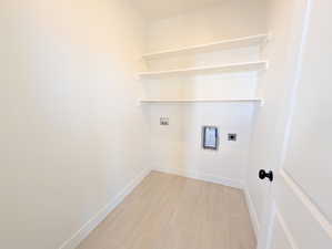 Upper Laundry room featuring washer hookup and electric dryer hookup