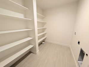 Basement Laundry room featuring hookup for a washing machine and hookup for an electric dryer