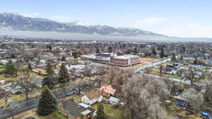 Aerial view of residential area with a mountainous background