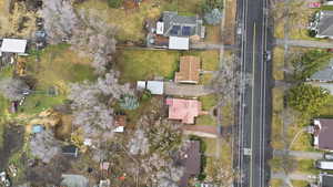 Aerial overview of property's location featuring nearby suburban area