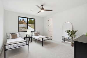 Bedroom with light carpet and ceiling fan