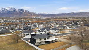 Aerial view of residential area with a mountainous background