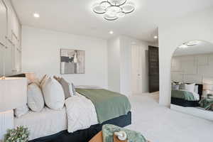 Carpeted bedroom featuring recessed lighting
