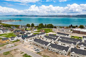 Aerial view of residential area featuring a water and mountain view