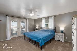 Bedroom featuring french doors, light carpet, a textured ceiling, access to outside, and ceiling fan