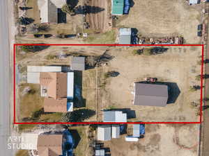 Aerial overview of property's location with property parcel outlined