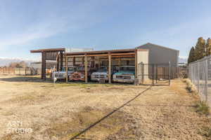 View of pole building featuring a carport