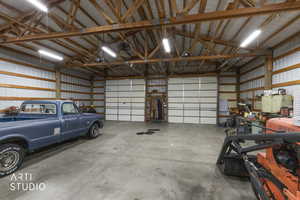 Garage featuring metal wall