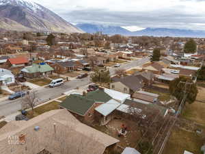 Aerial view of residential area featuring mountains