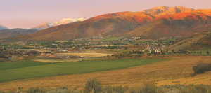 View of mountain backdrop featuring rural landscape