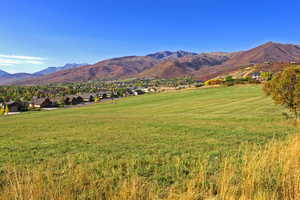 View of mountain backdrop with nearby suburban area