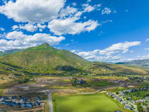 Mountain view featuring nearby suburban area