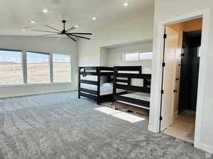 Bedroom with light carpet, recessed lighting, and ceiling fan