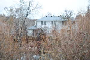 View of back of property from across the Logan River.