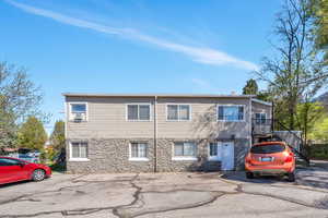 View of front of home featuring stone siding