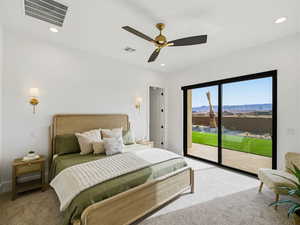 Carpeted bedroom featuring access to outside, a mountain view, a ceiling fan, and recessed lighting