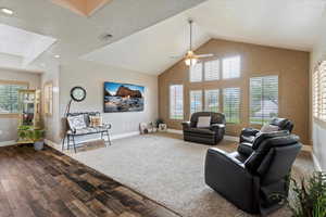 Vaulted ceilings, abundant natural light, wood-look porcelain tile flooring on the main level