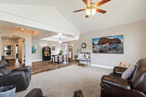 Vaulted ceilings, abundant natural light, wood-look porcelain tile flooring on the main level