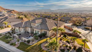 Aerial perspective of suburban area with a mountain backdrop