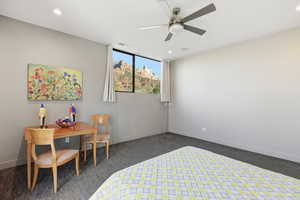 Bedroom with carpet floors, a ceiling fan, and recessed lighting