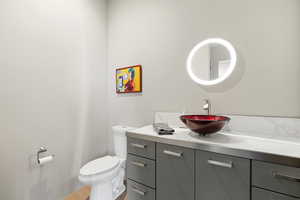 Bathroom with toilet and vanity