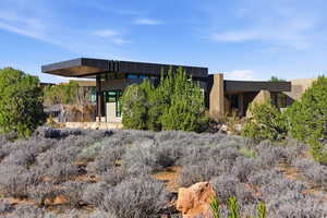 Back of house with stucco siding