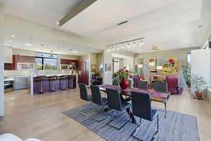 Dining area featuring light wood-type flooring and recessed lighting