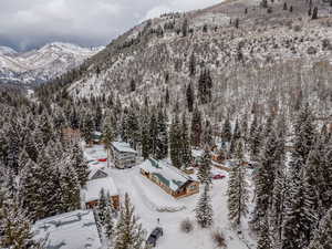 Snowy aerial view with a mountain view