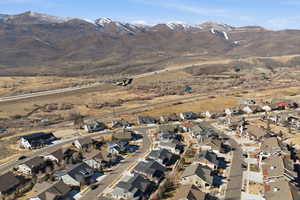 View of property location with nearby suburban area and a mountainous background