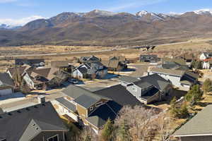 Aerial view of residential area with a mountain backdrop