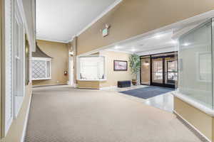 Common area featuring ornamental molding
