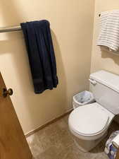 Bathroom featuring a textured wall