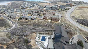 Aerial overview of property's location with nearby suburban area