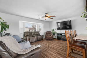 Living area featuring ceiling fan and LVP floors