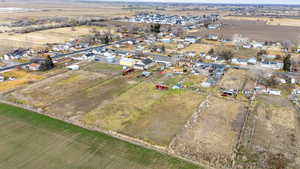 Overview of rural landscape featuring nearby suburban area