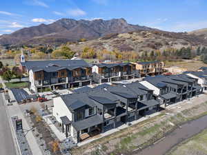 Aerial view of residential area with mountains